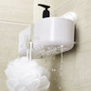 Douche rek wit met zuignappen bevestigd aan douche wand met shampoo onder stromend water